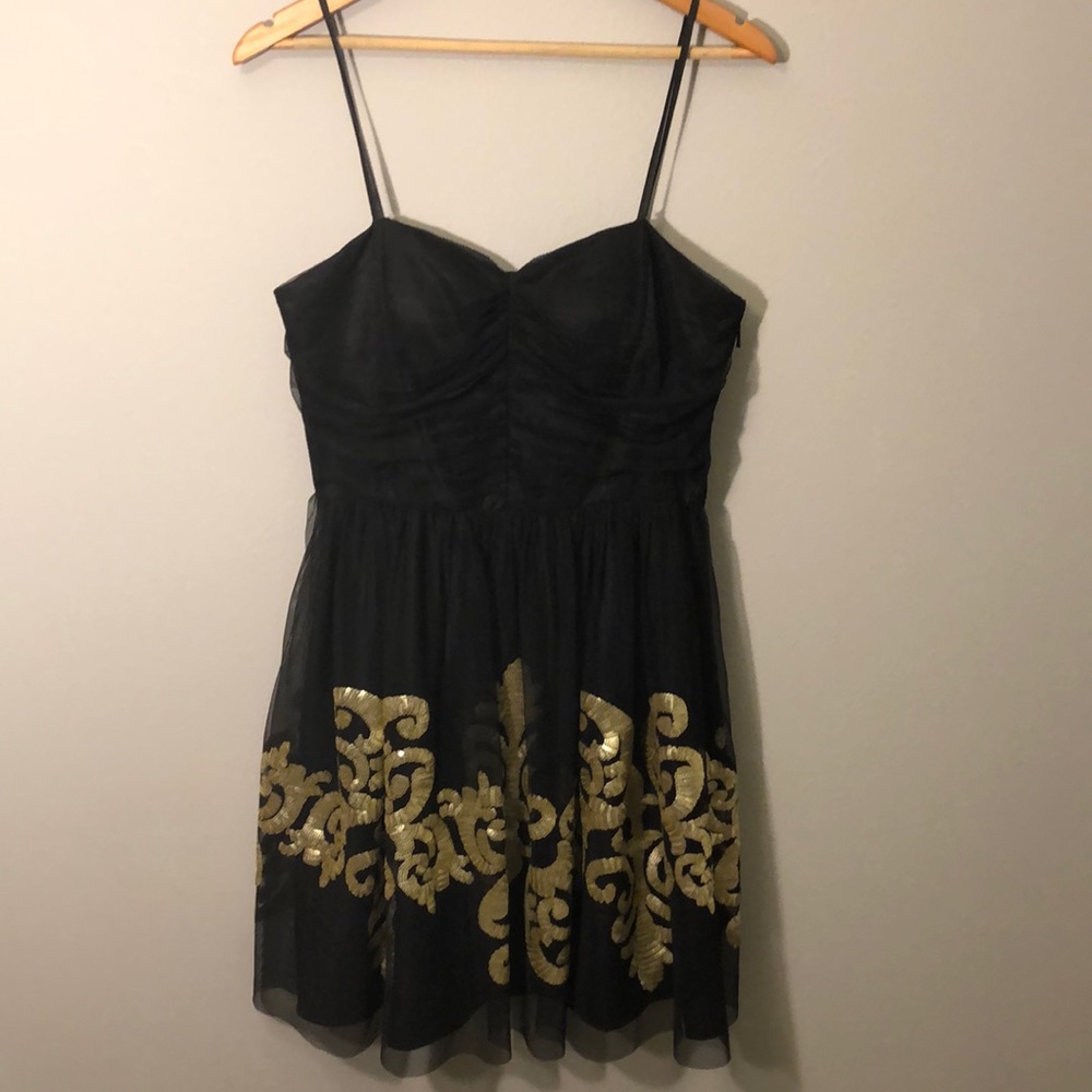 Black dress with gold sequins
